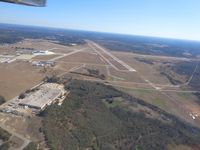  @ Florence Regional Airport - In the traffic pattern, looking east. - by Bob Simmermon