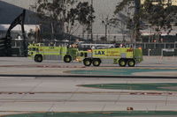  - LAX ARFF 80 and ARFF 280 escorting an aircraft to the American Maintenance Hangar. 
 - by Mark Kalfas