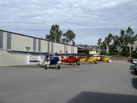  - First Sunday Aviation Museum of Santa Paula with four 1946 Aeronca 7AC CHAMPIONs on the ramp. Early photo-one more 7AC arrived plus a 1946 11AC Chief parked on the nearby transient ramp. - by Doug Robertson