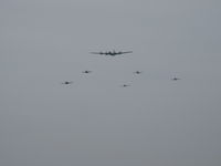  - CMA Field overflight of N529B Boeing B-29 SUPERFORTRESS 'FIFI' accompanied by local CAF fighter aircraft escorts. Second pass overhead at lower altitude. - by Doug Robertson