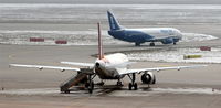  - One is resting on apron west and one is lining up for take off on rwy 07.... - by Holger Zengler