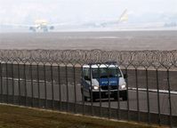  - Several kinds of traffic behind the barbwire..... - by Holger Zengler