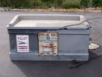  - Attractive Vintage Sign on aircraft's supplies/tool box at tiedown site. NOTE PRICE of RIDE! - by Doug Robertson