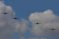  - four Bulldogs in formation over Kemble - by Chris Hall