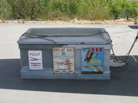 - Added attractive vintage aviation sign on aircraft maintenance box adjacent N8972G tiedown. - by Doug Robertson