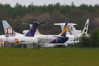  - storage area at Lasham, three former BMI Baby B737's at the rear and from L to R are N217FE Boeing 727 2S2F, VP-BVU Boeing 737-5Q8, N279CS	Boeing 737-33V and M-FAHD	Boeing 727-76 - by Chris Hall