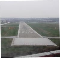  - On short final for runway 32 on a rainy day at St. Paul Downtown Airport. - by Kreg Anderson
