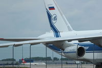  - At the fence at apron 2 you can see under an AN 124 right wing arriving aircraft of THY/TURKISH on apron 1..... - by Holger Zengler