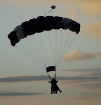  - Sunset drop organised by Skydive Swansea to mark the final day of the Heroes Challenge UK 1283 mile fund raising cycle ride from John O'Groats to Lands End. - by Roger Winser