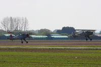  - CASA 1-131E Jungmann's G-BZJV and G-CDJU displaying at the Vintage Aircraft flyin, Sleap - by Chris Hall