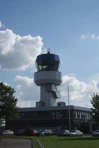  - The control tower of Eelde airport. Because of the sunny weather it is busy at and around the airport, but when it is sunny also the sunblinds have been taken down. - by Jorrit de Bruin