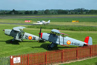  - CASA 1-131E Jungmann's G-BZJV and G-CDJU at Sleap - by Chris Hall