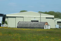 - one of the two surviving Pentad Hangar at the former RNAS Hinstock, also known as: HMS Godwit / No 21 SLG / RAF Ollerton . In use between 17 October 1941 and 28 February 1947 - by Chris Hall