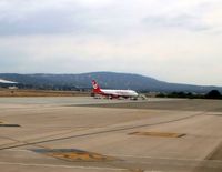  - Taxiing to 24L. There is an an all white DC9 on the left which looks abandoned.  - by Guitarist