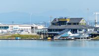  - The Harbour Air Seaplanes Terminal is adjacent to the YVR South Terminal on the Fraser River. - by M.L. Jacobs
