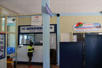  - The waiting room at EUX. You can see a very interesting little exhibition of the aviation history in St. Eustatius and other Caribbean islands while waiting for departure. - by Tomas Milosch