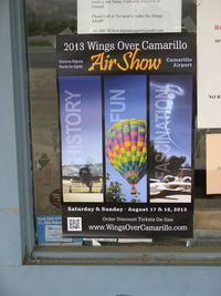  - Office poster advertising the 2013 Wings Over Camarillo Air Show-17-18 August at CMA. N157LB 2001 Lindstrand 90A Balloon, AX-8 class illustrated in center panel. More airshow info in the A-D Forum under Events. - by Doug Robertson