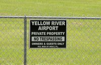  @ Yellow River Airstrip Airport - SIGN ON FENCE AT AIRPORT - by dennisheal
