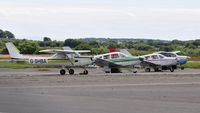  - Visiting aircraft on the apron. - by Roger Winser
