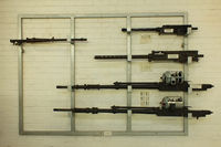  - Display of Armament fitted to the Spitfire, 0.303 in Browning machine gun, 50 in M2 Browning machine gun, 20 mm Hispano Mk II cannon. on the left is a German 7.92 mm MG 15 machine gun used in the He 111 - by Chris Hall
