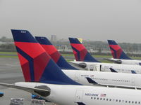  - Delta  Tails at Schiphol Airport  - by Henk Geerlings