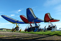  - four flexwing microlites from Barton at Breighton's Pre Hibernation Fly-in, 2013 - by Chris Hall
