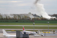  - white aircraft, white smoke at VIE - by Andreas Ranner