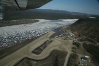  @ Hughes Airport - Minor airport flooding at Hughes, Alaska during breakup of the Koyukuk River.  Pilot was Daniel Hayden, taken from Wright Air N4637U. - by David Lee