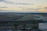  @ San Diego International Airport - Looking down Runway 27 from a parking garage! - by flyboybma