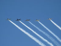  - Warbirds in echelon flight with smoke over CMA - by Doug Robertson