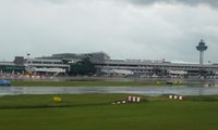  - Changi Airport on a rainy day - by Jean M Braun