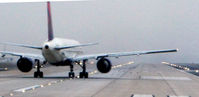  - Delta Aircraft on the active runway Atlanta - by Ronald Barker