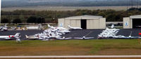  - Looking at some of the general aviation that flew in for the week of Formula One Racing in Austin - by Ronald Barker