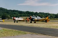  - North American T-6 and SNJ at the 1993 Sussex Air Show, Sussex, NJ  - by scotch-canadian