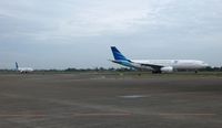  - Aircrafts queue on taxiway at SOEKARNO-HATTA International Airport Jakarta. In 2012 / 2013 CGK has ranked 9th bussiest airport in the world (link : http://www.world-airport-codes.com/world-top-30-airports.html  ) - by NN
