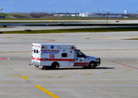  - Ambulance on the O'Hare ramp - by Ronald Barker