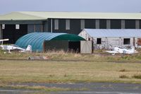  - Recently erected hangar to house Vans aircraft including two RV-8's of Team Raven formation aerobatic team. G-VFDS and G-EGRV can be seen outside the hangar. - by Roger Winser
