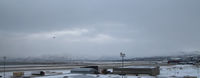 - Alta's runway viewed across dockside buildings; terminal to rear right of picture. - by Pete Hughes