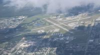  - On an Air Tran flight MCO-DTW, departing from MCO over Kissimmee Airport - by Florida Metal