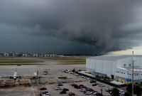  - Looking southwest over MIA, strong storm rolls in off of the ocean over Coral Gables, Westchester and Fountainebleau before hitting MIA - by Florida Metal