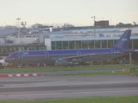  - BMI A-321 taxi past terminal 1 at Heathrow - by John J. Boling