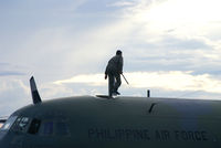  - 107 - Check out the Flight Engineer walking on the Roof of this Herc to check Fuel Level in the Wingtanks with a wooden stick he is carrying with him. - by The_Planespotter