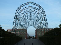  - The 260-foot long Portable Airship Hangar made up of 112 riveted lattice frames and bolted together to form the 70ft high structure. It is the centrepiece of the new business park that now occupies part of the former Farnborough Airfield site. - by Chris Hall