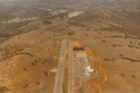  @ Calaveras Co-maury Rasmussen Field Airport - Nice airport and it replaced the old airport (in the mid 80s) that was a short walk to downtown San Andreas which was nice. O well-I guess they call this progress ? View is north with old cement plant (long closed) top left and town of S A top right. - by S B J
