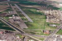  - L B as it looked in 1994 with N9078E on very short final.This was one of our many stops at LB  to eat! View is north. - by S B J