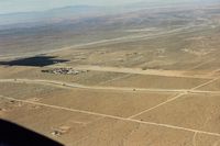  - Difficult to see but its next to the housing development and the dark area. View is northeast. - by S B J