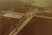  - Schellville in early 1984 when it still had the (nice) dirt runways.The water between the runway and taxiway made it very interesting! Was not a good place to groundloop. - by S B J