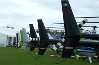  - Robinson Tails at AeroExpo 2014 - by Chris Hall