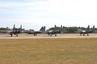  - F15s 222 / 331 / 306 and 222 about to scramble - by John Coates