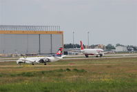  - Inbound traffic on rwy 25L observed by taxiing twin engined aircraft at holding point.... - by Holger Zengler